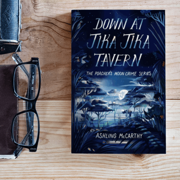Product shot of Down at Jika Jika Tavern, the first book in The Poacher's Moon Crime Series.